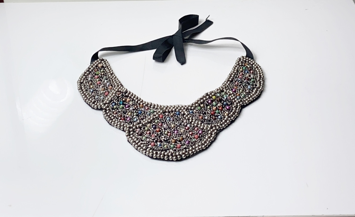 Female neck bead